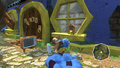 Banjo standing outside his house at the start of Banjo-Kazooie: Nuts & Bolts.